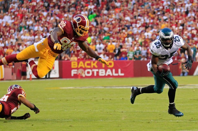 Even a flying Orakpo can't stop McCoy. 