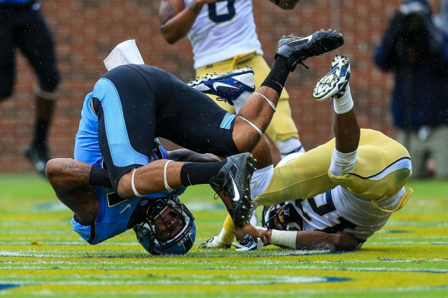 North Carolina Tar Heels tight end Eric Ebron lands in the end zone for a touchdown with coverage by Georgia Tech Yellow Jackets defensive back Demond Smith at Bobby Dodd Stadium. (Daniel Shirey-USA TODAY Sports)