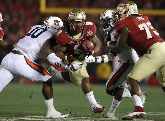 Florida State Seminoles tailback Devonta Freeman runs with the ball against Auburn Tigers during the 2014 BCS National Championship game at the Rose Bowl. (Matthew Emmons - USA TODAY Sports)
