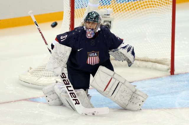USA goalkeeper Jessie Vetter (31) makes a save against Finland during theomen's ice hockey preliminary round game in the Sochi 2014 Olympic Winter Games at Shayba Arena. (Credit: Winslow Townson - USA TODAY Sports)