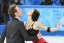 Nathallie Pechalat and Fabian Bourzat of France perform in the team ice dance short dance program during the Sochi 2014 Olympic Winter Games at Iceberg Skating Palace. Mandatory Credit: Robert Deutsch-USA TODAY Sports