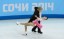 Meryl Davis and Charlie White of the USA perform in the team ice dance short dance program during the Sochi 2014 Olympic Winter Games at Iceberg Skating Palace. Mandatory Credit: Richard Mackson-USA TODAY Sports