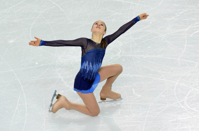 Yulia Lipnitskaya (RUS) performs during the team ladies short program during the Sochi 2014 Olympic Winter Games at Iceberg Skating Palace. Mandatory Credit: Richard Mackson-USA TODAY Sports
