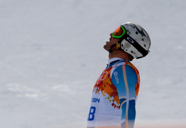 Askel Lund Svindal (NOR) reacts after his run in the men's downhill during the Sochi 2014 Olympic Winter Games at Rosa Khutor Alpine Center. Mandatory Credit: Paul Bussi-USA TODAY Sports