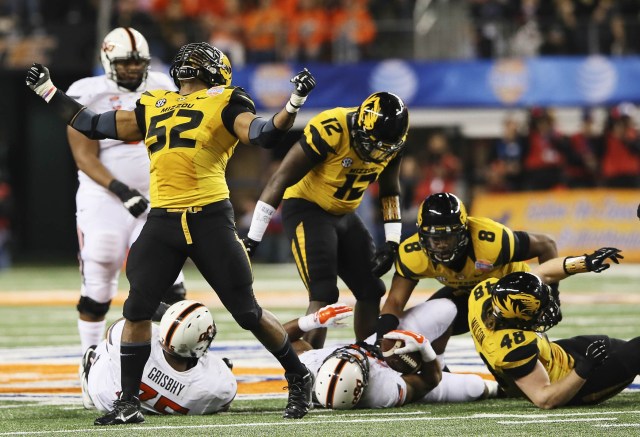 Missouri Tigers defensive lineman Michael Sam reacts after a play against the Oklahoma State Cowboys. (Kevin Jairaj-USA TODAY Sports)