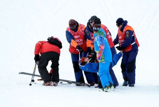  Yuki Tsubota (CAN) is helped off the course after a fall in the ladies' slopestyle finals during the Sochi 2014 Olympic Winter Games at Rosa Khutor Extreme Park. Mandatory Credit: Jack Gruber-USA TODAY Sports