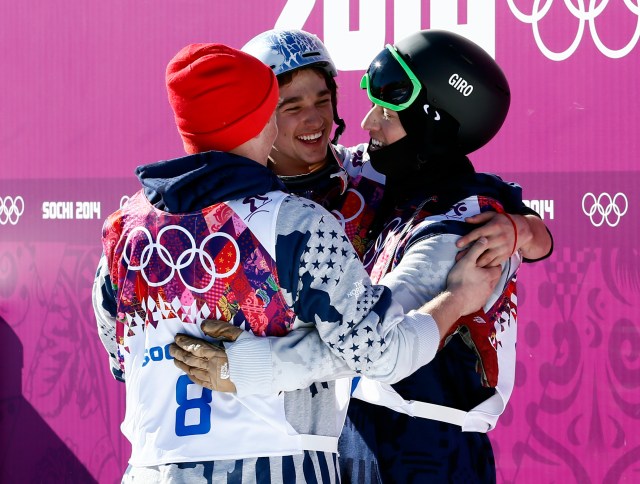 Joss Christensen (USA, right) celebrates winning gold with Gus Kenworthy (USA, left) who won silver and Nicholas Goepper (USA, center) who won bronze in the men's ski slopestyle final during the Sochi 2014 Olympic Winter Games at Rosa Khutor Extreme Park. (Rob Schumacher-USA TODAY Sports)