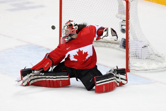 Canada goalkeeper Shannon Szabados (1) makes a save against Brianna Decker. (Winslow Townson, USA TODAY Sports)