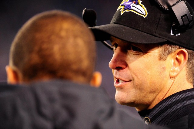 Baltimore Ravens head coach John Harbaugh talks to running back Ray Rice during a game against the New York Giants. (Evan Habeeb - USA TODAY Sports)