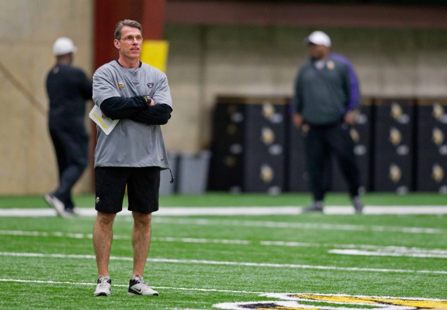 Minnesota Vikings general manager Rick Spielman looks over players as they stretch at the Rookie Minicamp at Winter Park. (Bruce Kluckhohn - USA TODAY Sports)