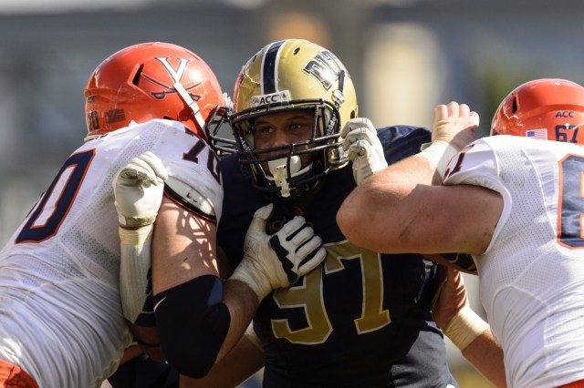  Pittsburgh Panthers defensive lineman Aaron Donald is blocked by Virginia Cavaliers offensive guard Luke Bowanko and center Jackson Matteo at Heinz Field. (Howard Smith - USA TODAY Sports)