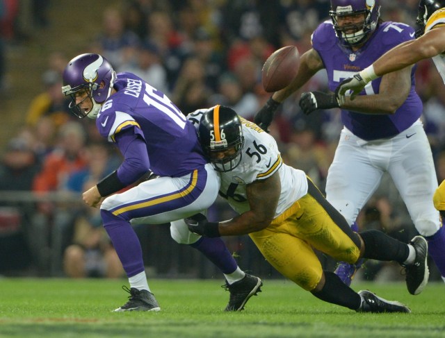Pittsburgh Steelers linebacker LaMarr Woodley forces a fumble by Minnesota Vikings quarterback Matt Cassel in the NFL International Series game at Wembley Stadium. (Kirby Lee - USA TODAY Sports)