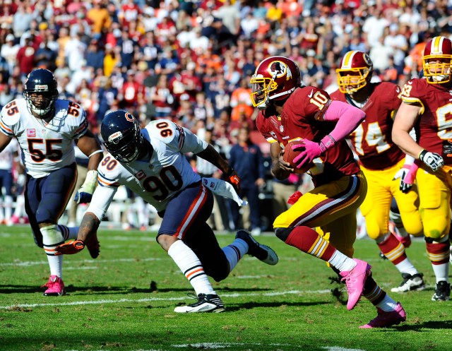Julius Peppers (left) and Robert Griffin III (Brad Mills-USA TODAY Sports)