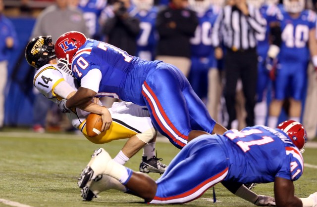 Southern Miss Golden Eagles quarterback Nick Mullens is sacked by Louisiana Tech Bulldogs defensive tackle Justin Ellis at Joe Aillet Stadium. (Chuck Cook - USA TODAY Sports)