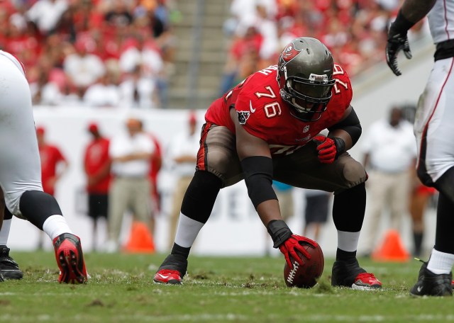 Tampa Bay Buccaneers center Jeremy Zuttah gets ready to hike the ball against the Atlanta Falcons at Raymond James Stadium. (Kim Klement - USA TODAY Sports)