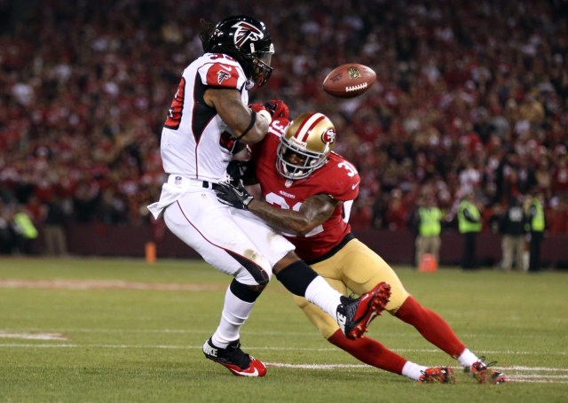 San Francisco 49ers strong safety Donte Whitner is called for a penalty on the play against Atlanta Falcons running back Steven Jackson during the final regular season game at Candlestick Park. (Kelley L Cox - USA TODAY Sports)