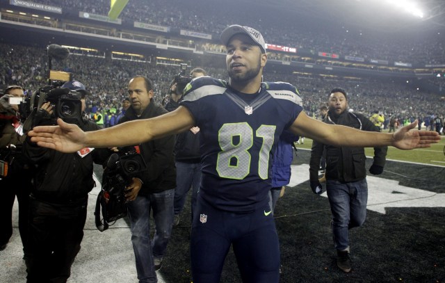 Seattle Seahawks wide receiver Golden Tate celebrates as he leaves the field after the 2013 NFC Championship football game. (Joe Nicholson - USA TODAY Sports)