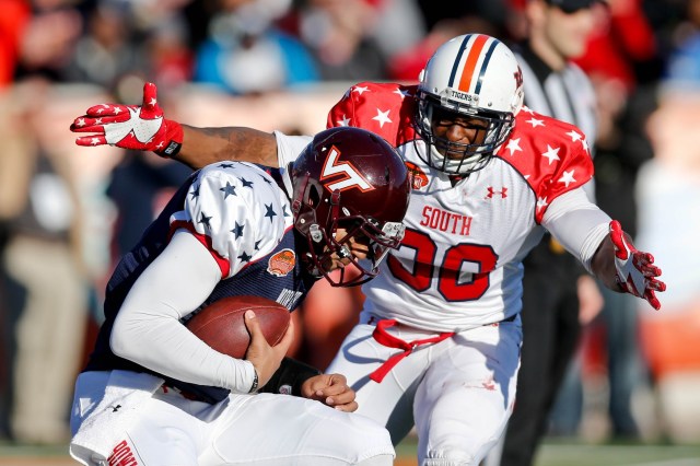 South squad defensive end Dee Ford of Auburn sacks North squad quarterback Logan Thomas of Virginia Tech during the first half of the Senior Bowl. (Derick E. Hingle - USA TODAY Sports)