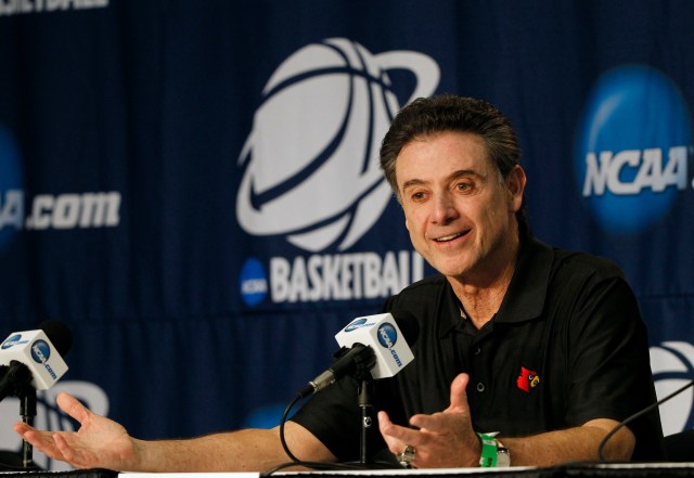 Louisville Cardinals head coach Rick Pitino addresses the media prior to practice before the second round of the 2014 NCAA Tournament at Amway Center. Kim Klement-USA TODAY Sports.