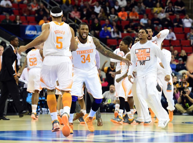 Tennessee Volunteers forward Jeronne Maymon (34) and Tennessee Volunteers forward Jarnell Stokes (5) react with the bench against the Mercer Bears during the first half of a men's college basketball game during the third round of the 2014 NCAA Tournament at PNC Arena. Bob Donnan-USA TODAY Sports.