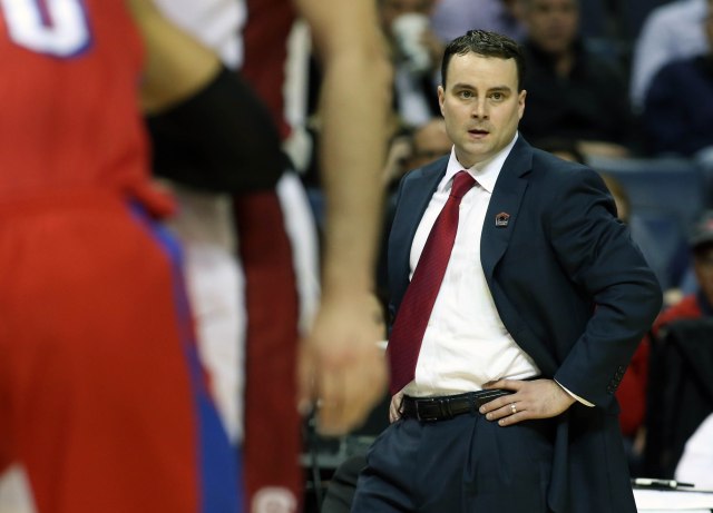 Dayton Flyers head coach Archie Miller watches from the sideline against the Stanford Cardinal during the first half in the semifinals of the south regional of the 2014 NCAA Mens Basketball Championship tournament at FedExForum. Nelson Chenault-USA TODAY Sports.