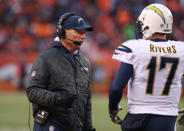 Ken Whisenhunt talks with San Diego Chargers QB Philip Rivers during a timeout against the Denver Broncos during the 2013 AFC divisional playoff football game at Sports Authority Field at Mile High. (Matthew Emmons - USA TODAY Sports)