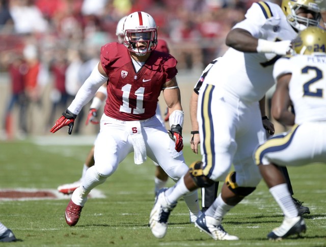 Former Stanford Cardinal linebacker Shayne Skov (11) looks for the ball carrier during the second quarter against the UCLA Bruins at Stanford Stadium. (Bob Stanton - USA TODAY Sports)