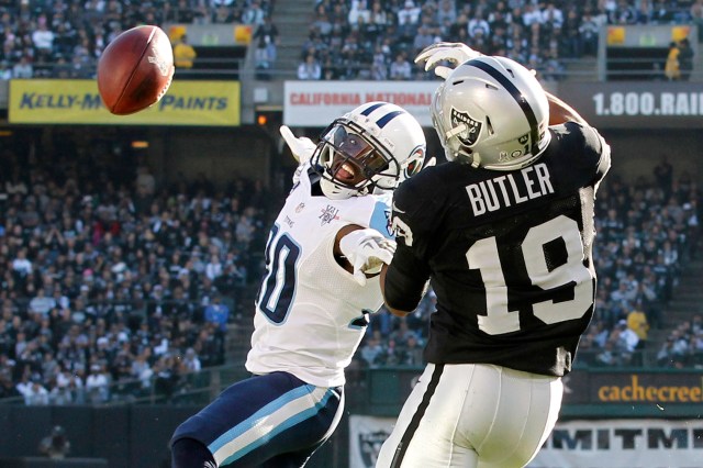 Tennessee Titans cornerback Jason McCourty breaks up a pass intended for Oakland Raiders wide receiver Brice Butler in a game at O.co Coliseum. (Cary Edmondson - USA TODAY Sports)