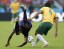 This tackle earned Australia captain Tim Cahill a yellow card, his second of the tournament. As a result, he'll miss the Socceroos' final match in group play against Spain. (Edgard Garrido, REUTERS)