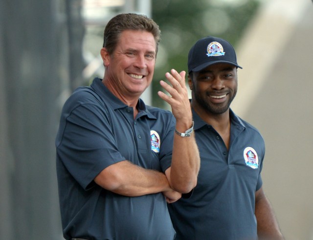 Dan Marino (left) and Curtis Martin at the 2013 Pro Football Hall of Fame Enshrinement at Fawcett Stadium. Mandatory. (Kirby Lee, USA TODAY Sports)