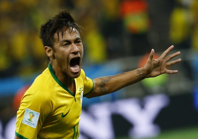 Brazil striker Neymar delivered on the pre-tournament hype, scoring twice in the opening game of the World Cup. (Damir Sagolj, REUTERS)