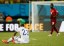 United States defender Fabian Johnson (23) sits on the ground after the final whistle as Portugal forward Varela (18), who scored the tying goal, walks past. (Winslow Townson, USA TODAY Sports)