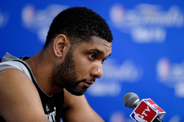Tim Duncan (21) speaks to the media after practice before game one of the 2014 NBA Finals. (Bob Donnan, USA TODAY Sports.)