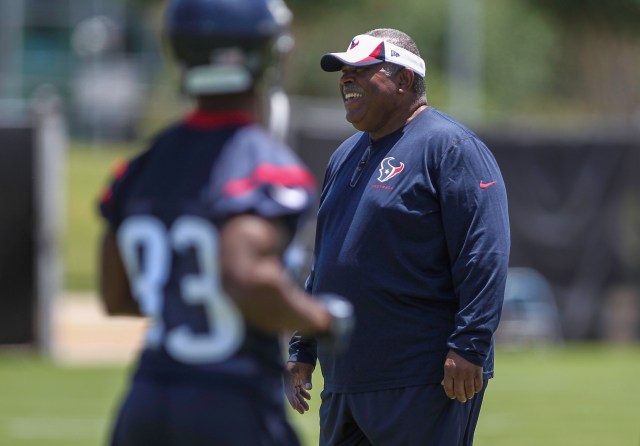 Houston Texans defensive coordinator Romeo Crennel smiles during rookie mini-camp. (Troy Taormina-USA TODAY Sports)