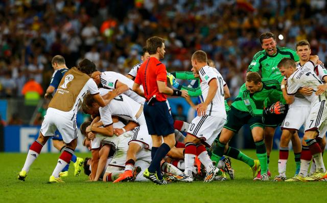 Germany's players celebrate after their win against Argentina in their 2014 World Cup final. (REUTERS/Darren Staples)