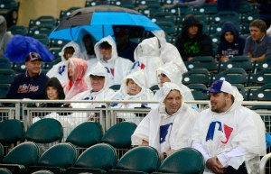 Fans at Target Field have their rain ponchos on, but the Home Run Derby is underway after a one-hour delay. (Jeff Curry, USA TODAY Sports)