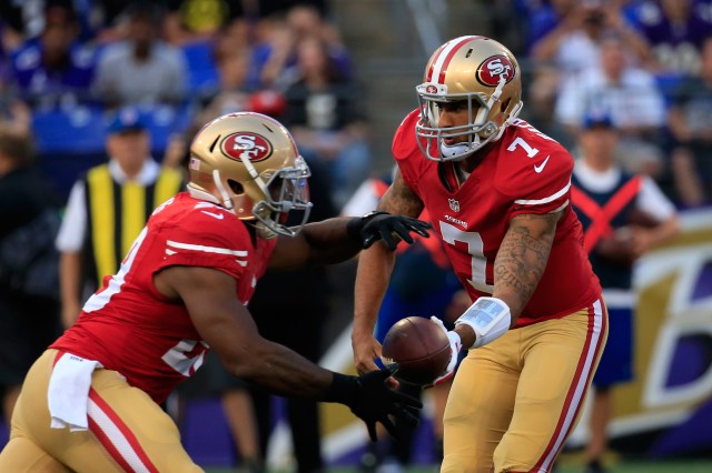 49esr rookie RB Carlos Hyde, left, had a solid NFL debut. (Rob Carr-Getty Images) 