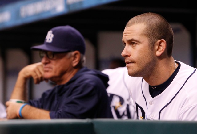 Tampa Bay third baseman Evan Longoria (right) and manager Joe Maddon (left) are being wasted by the organization. (Kim Klement, USA TODAY Sports)