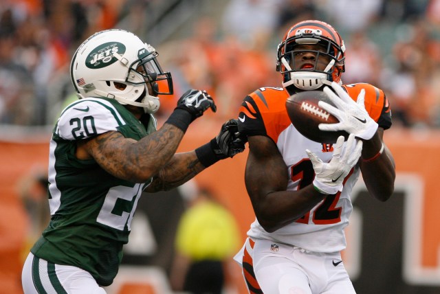 Mohamed Sanu (12) scores a touchdown against New York Jets cornerback Kyle Wilson (20). (Mark Zerof-USA TODAY Sports)