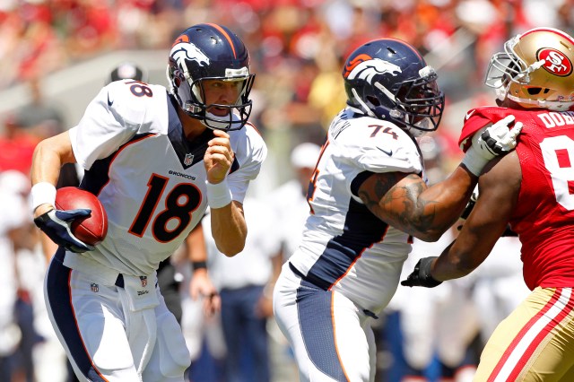 Peyton Manning's decision to run caught everyone off guard. (Cary Edmondson, USA TODAY Sports)