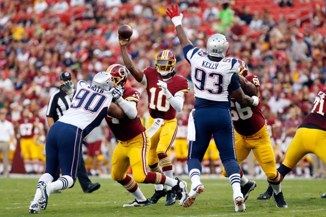 Washington Redskins quarterback Robert Griffin III (10) throws the ball against the New England Patriots in the first quarter at FedEx Field. (Geoff Burke-USA TODAY Sports)