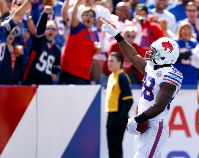 Buffalo Bills running back C.J. Spiller (28) point to the fans after running back a kickoff 102 yards for a touchdown during the second half against the Miami Dolphins. (Kevin Hoffman-USA TODAY Sports)