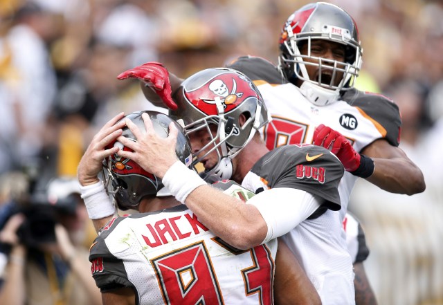 The Tampa Bay Buccaneers celebrate a game winning touchdown catch by wide receiver Vincent Jackson (83) against the Pittsburgh Steelers. The Buccaneers won 27-24. (Charles LeClaire-USA TODAY Sports)