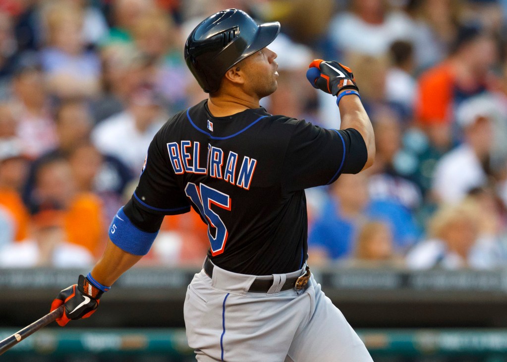 The New York Mets sign Carlos Beltran to play center field for the