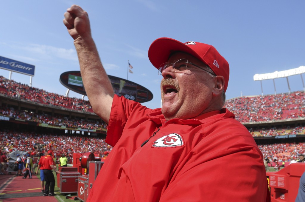 Andy Reid is celebrating winning a football game and not the success of Craigslist. (AP Photo/Ed Zurga, File)
