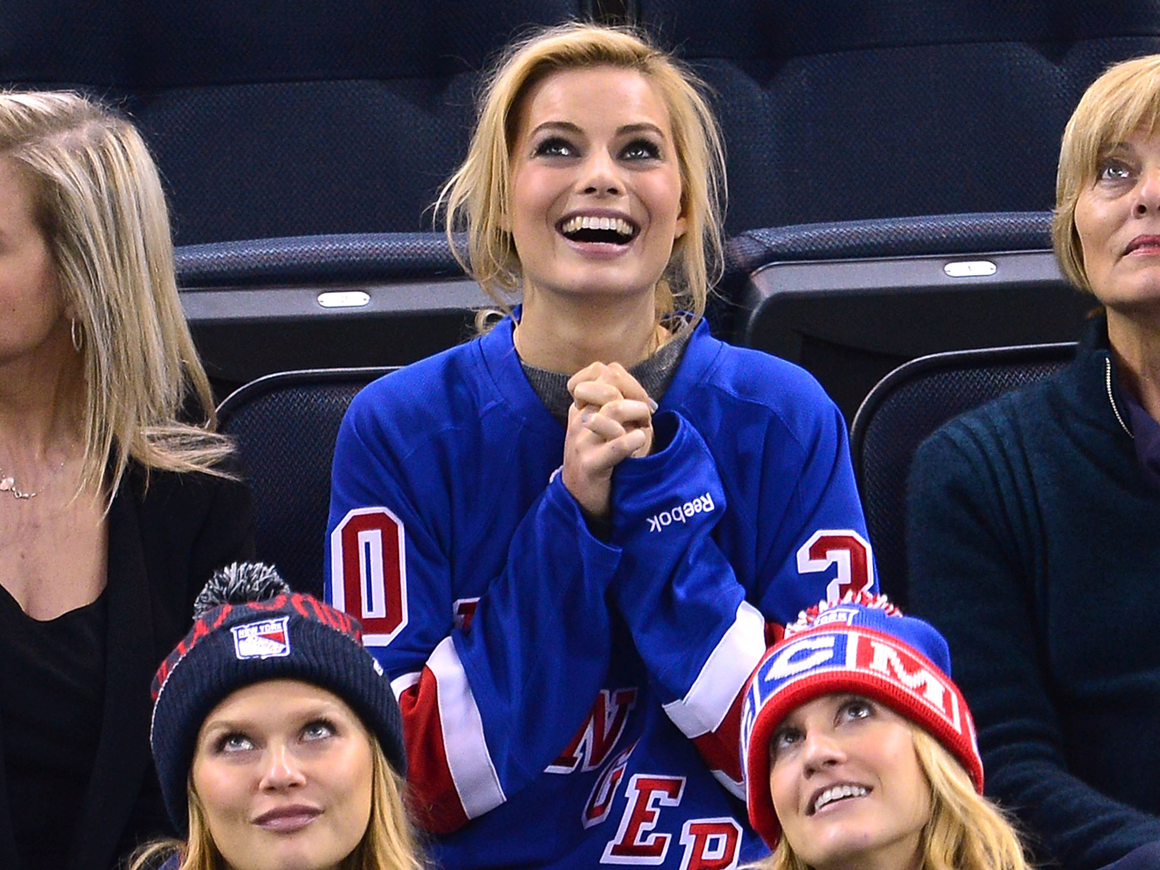 Margot Robbie attends a New York Rangers game on December 12, 2013.  (Photo by James Devaney/FilmMagic) 