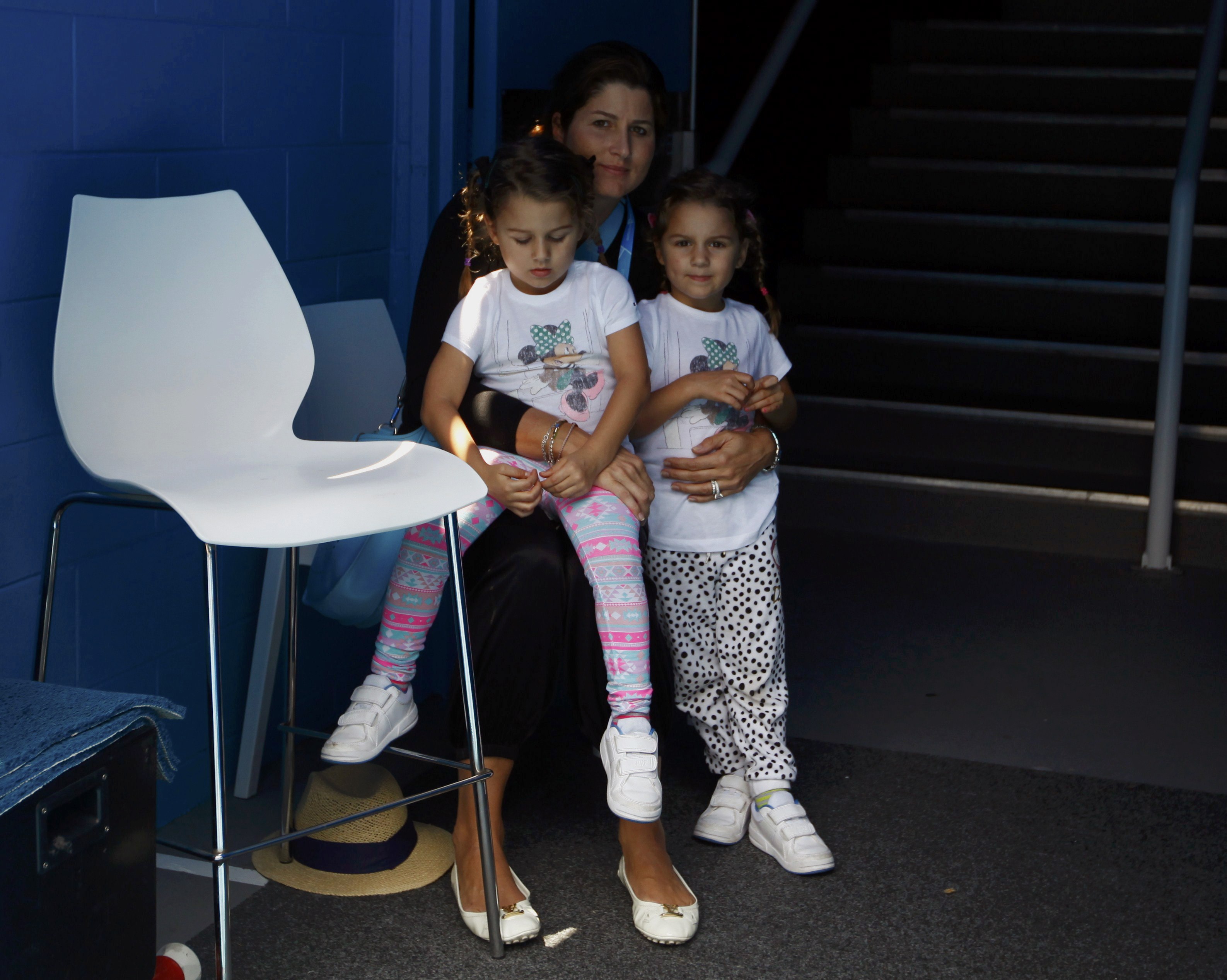 Mirka and the four-year-old Federer twins wait at the Australian Open. (Reuters)