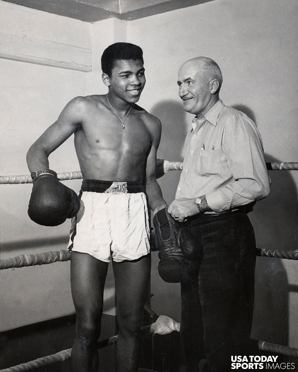 Joe Martin (right) with Cassius Clay, later known as Muhammad Ali (left), when he was a top prospect in 1960. Martin was Ali's first boxing teacher.  //  Credit: Tom Easterling, The Courier-Journal, USA TODAY Sports
