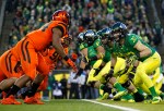 EUGENE, OR - NOVEMBER 29: Evan Bayliss #32 of the Oregon Ducks guards Jabral Johnson #44 of the Oregon State Beavers during the 117th playing of the Civil War on Novemeber 29, 2013 at the Autzen Stadium in Eugene, Oregon. (Photo by Jonathan Ferrey/Getty Images)