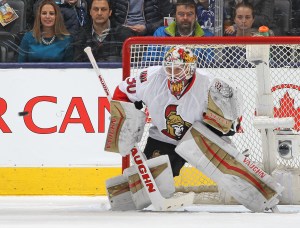 TORONTO, ON - MARCH 5: Andrew Hammond #30 of the Ottawa Senators gets set to face a shot against the Toronto Maple Leafs during an NHL game at the Air Canada Centre on March 5,2016 in Toronto, Ontario, Canada. The Senators defeated the Maple Leafs 3-2. (Photo by Claus Andersen/Getty Images)